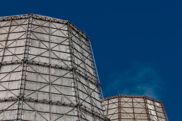 Wall Mural - Cooling of hot salt water in steam units of the cooling tower of an industrial enterprise