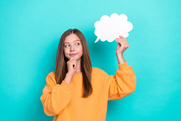 Sticker - Photo of young minded schoolgirl nerd touch chin look interested mockup hold paper cloud genius solution isolated on aquamarine color background