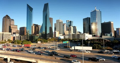 Wall Mural - Downtown city skyline view of the modern financial district buildings over the traffic on the highway in Dallas Texas USA