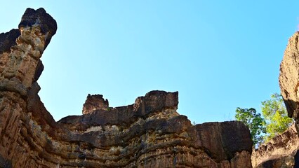 Canvas Print - Pha Chor in Mae Wang National Park at Chiang Mai Province, Thailand.  This place is a large rock cliff formed by the deposition of layers of soil over long period of time and water erosion.