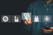 © Mongta Studio - Automation business technology concept, Person hand poiting gear with automation technology icon on VR screen, software development, Business process and technology.