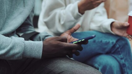 young people using smartphones in the subway.