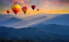 Colorful Hot Air Balloons Flying Above High Mountain At Sunrise With Beautiful Sky Background. Aerial From Doi Pui Co, Mae Hong Son In Thailand