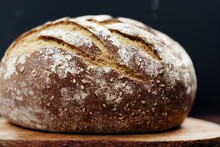 Large Lush Loaf Of Sourdough Bread With Beautiful Brown Crust