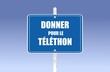 La phrase «donner pour le téléthon» écrite en français sur un panneau routier	