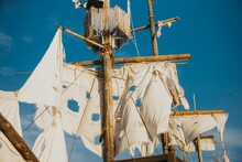 Old Pirate Ship Over A Background Of A Clear Sky