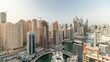 © HyperlapsePro - Panorama showing various skyscrapers in tallest recidential block in Dubai Marina aerial timelapse