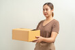 © littlestocker - Asian women holding parcel box package, shipment service and delivery courier concept