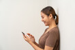© littlestocker - Asian women using smartphone. Online business concept.