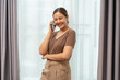 © littlestocker - Happy asian woman talking smartphone