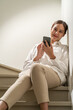 © littlestocker - Asian woman using smartphone. working online business.