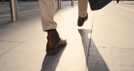 shoes, walking and city with a business man on his morning commute in work with motivation for succe