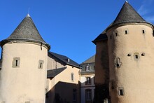 Three Towers Of Bourglinster Castle In Luxembourg.