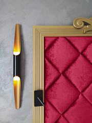 Velvet magenta upholstered panel headboard in golden frame and elegant wall sconces. Image toned by viva magenta color