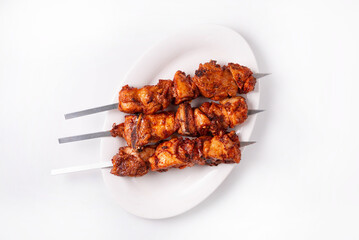 chicken meat kebab on a white background