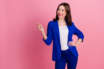 Sticker - Photo of young beautiful businesswoman wear blue formal suit look finger direct mockup good news from market isolated on pink color background