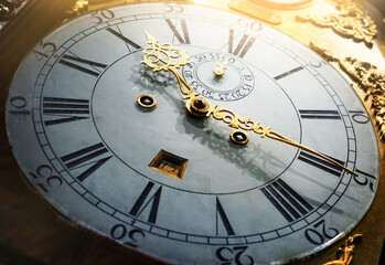 Close up old antique classic clock. Concept of time, history, science, memory, information. Retro style. Vintage watch, clock background.