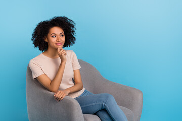 Sticker - Photo of nice brunette young lady wear t-shirt jeans sit isolated on blue color background