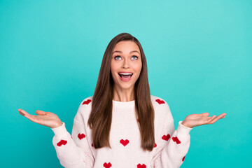 Poster - Portrait of astonished positive lady raise opened hands look up empty space isolated on turquoise color background