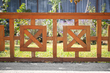 Sticker - Beautiful wooden fence near green lawn on sunny day outdoors