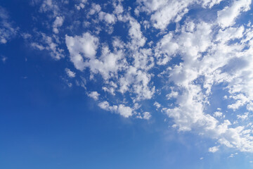 Poster - Blue sky with a white cloud background