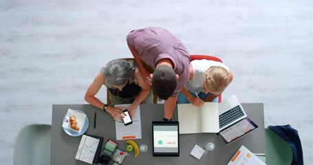 Leinwandbilder - Business people, working and tablet planning top view at office desk with teamwork for project. Collaboration, strategy and commitment of workplace people with notes, ideas and information.
