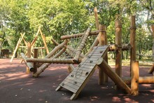 Wooden Modern Ecological Safety Children Outdoor Playground Equipment In Public Park. Nature Architecture Construction Playhouse In City. Children Rest And Childhood Concept. Idea For Games On Air.