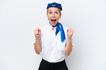 Wall Mural - Airplane blonde stewardess woman isolated on white background celebrating a victory in winner position