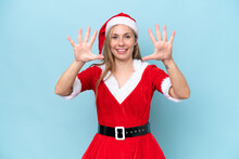 Young Blonde Woman Dressed As Mama Claus Isolated On Blue Background Counting Ten With Fingers
