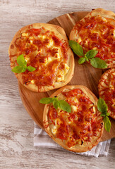 Wall Mural - Mini pizzas with mixed cheese