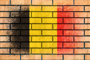 Flag of Belgium. Flag painted on a brick wall. Brick background. Copy space. Textured background