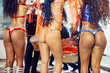 Ass, brazil and carnival with a woman in costume ready for a performance with a band at a festival of tradition. Concert, party and sexy with a female dance group at a celebration in rio de janeiro