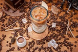 Fototapeta  - Mrożone cappuccino, mrożone caffe latte — kawa z mlekiem i kostkami lodu