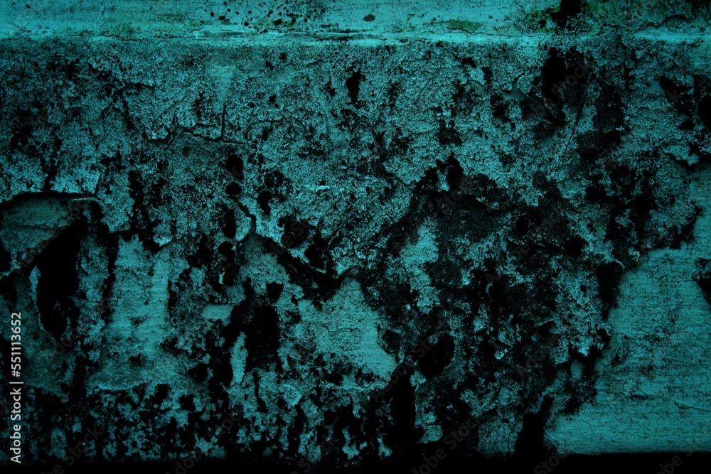 textured wall background with dark side, granite stone wall facade ...