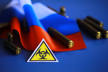 Wall Mural - Russian flag and bullet casings on the table. Background concept Russian army.