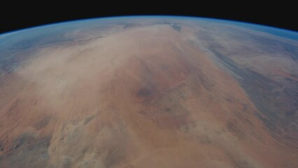 Wall Mural - flight over sahara duststorm. composed using photos from the international space station. elements o