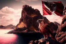 A Bird With A Flag On A Rock Near A Body Of Water And Mountains In The Background With A Flag Flying.