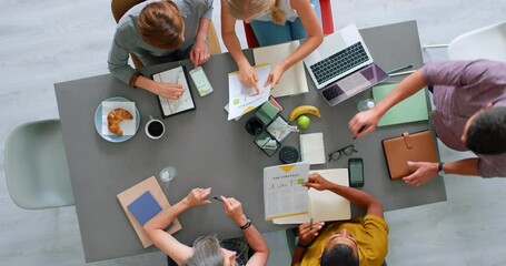 Leinwandbilder - Startup, business people and meeting for digital marketing, website copywriting and brainstorming ideas at office workspace from above. Manager, technology and team collaboration on a design proposal