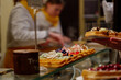 © Peeradontax - Selective focus at various topping on waffle on countertop of waffle stall at Christmas Market.