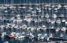 Many Yachts And Sailboats In Marina. Vacation, Cruising And Travel Concept 