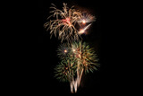 Fototapeta Dmuchawce - Abstract colored firework background light up the sky with dazzling display