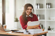 © itchaznong - American business woman making prepare presentation or important email of financial. Business Accountant working in home office
