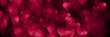 Trendy viva magenta color of the year 2023, pink red hearts, sparkling glitter bokeh panoramic background banner, valentines day abstract defocused texture header