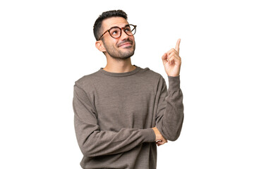 young handsome caucasian man over isolated background pointing up a great idea