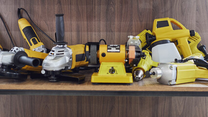 A professional tool for work, repair and construction in the store. Sale of wired power tools and battery powered equipment in the shop