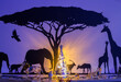 Christmas African Safari Wall Decor, with elephants, antelope and giraffe next to an Acacia tree, with lion ornmanets and an illuminated Glass Christmas tree against a sunset background wall.
