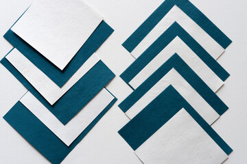 Sticker - abstract blue and white paper cards on blank paper