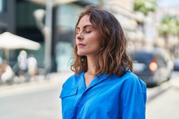 Sticker - Young woman smiling confident standing at street