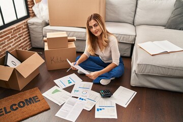 Sticker - Young blonde woman smiling confident controlling economy at new home