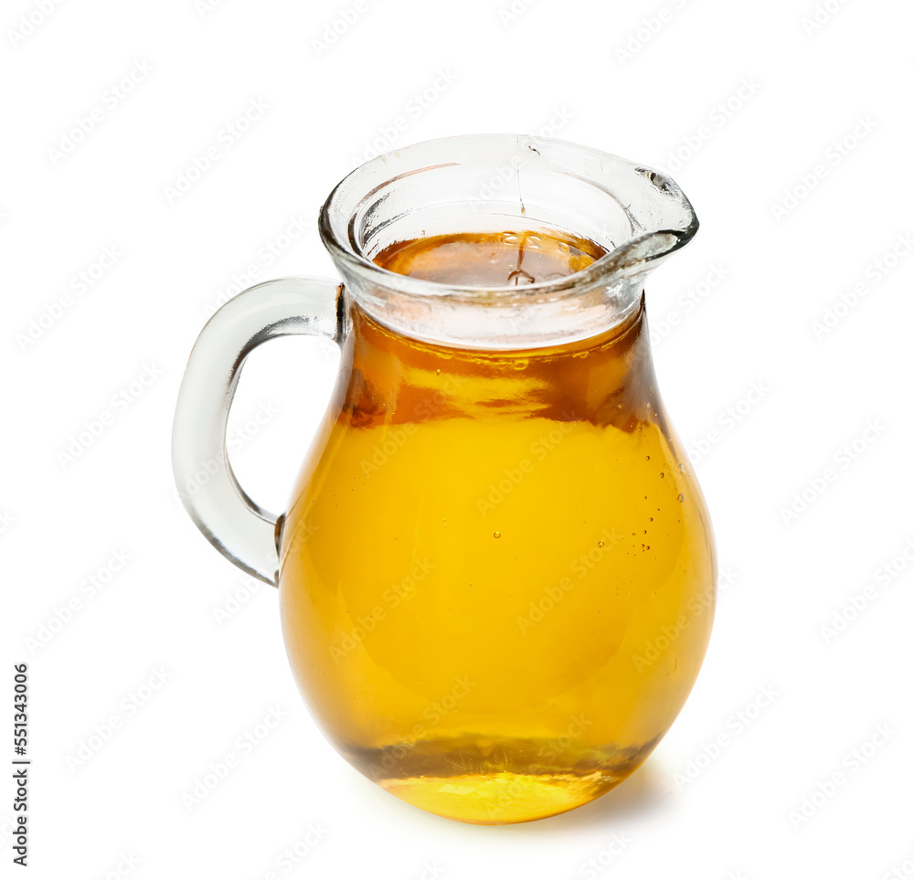 Jug of fresh apple juice on white background